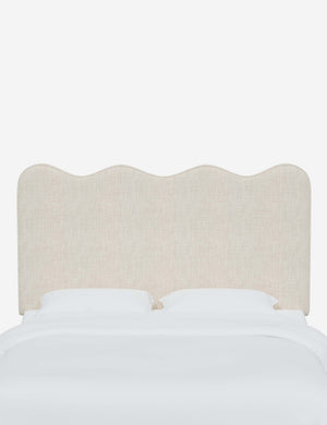 Clementine Talc Linen Headboard with a scalloped shape at the top