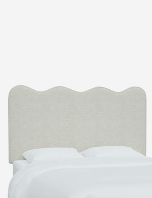 Angled view of the Clementine White Boucle Headboard