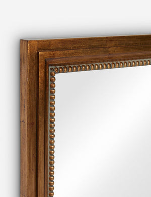 Top corner of the Corinne textural gold epoxy resin frame wall mirror.