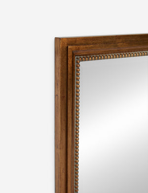 Top corner of the Corinne textural gold epoxy resin frame wall mirror.