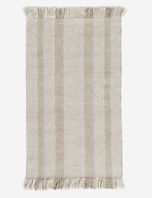 Small Croze handwoven striped fringed outdoor rug.