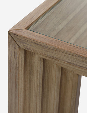 Close up of the Pender modern wood and glass top console table.