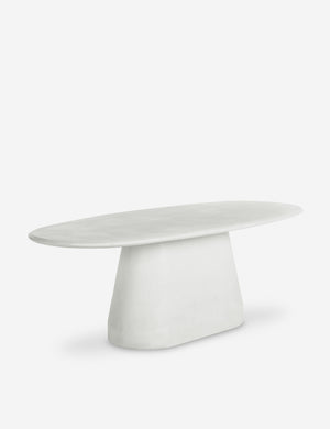 Aker oval concrete outdoor dining table.