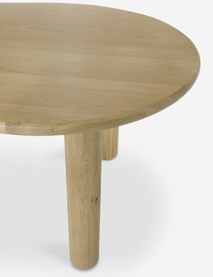Close up of the Dever oak wood oval dining table.