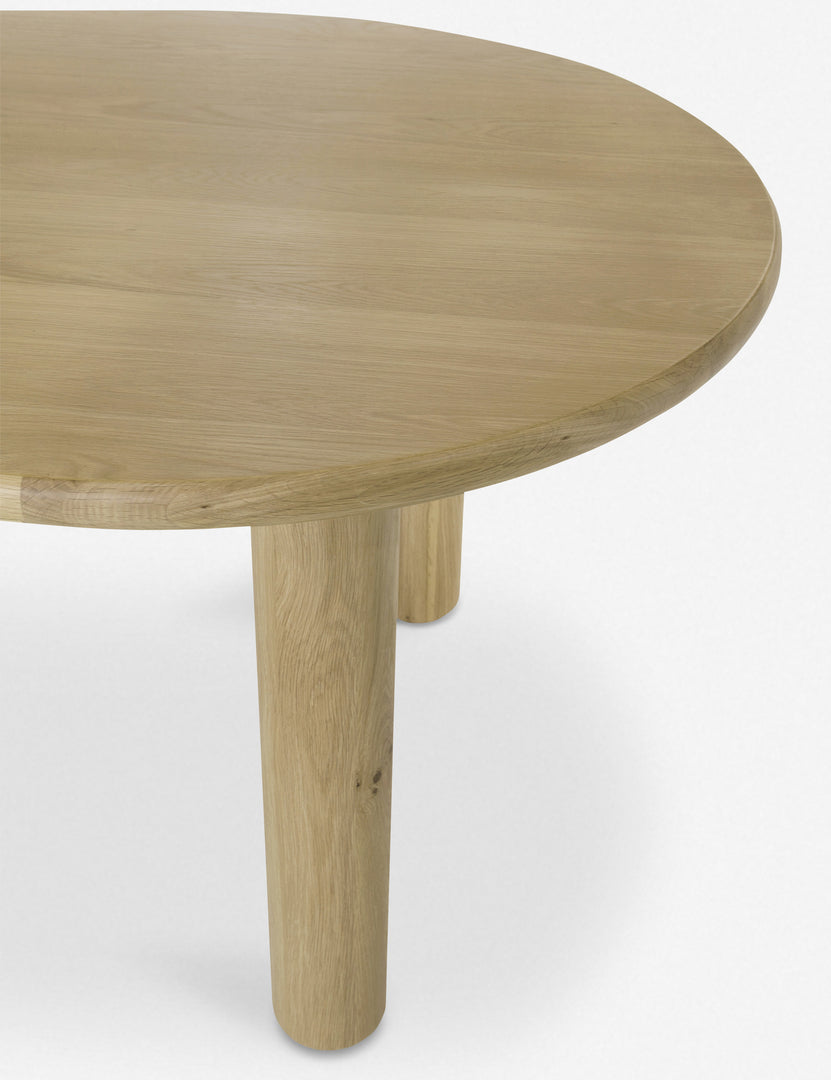 #color::natural | Close up of the Dever oak wood oval dining table.
