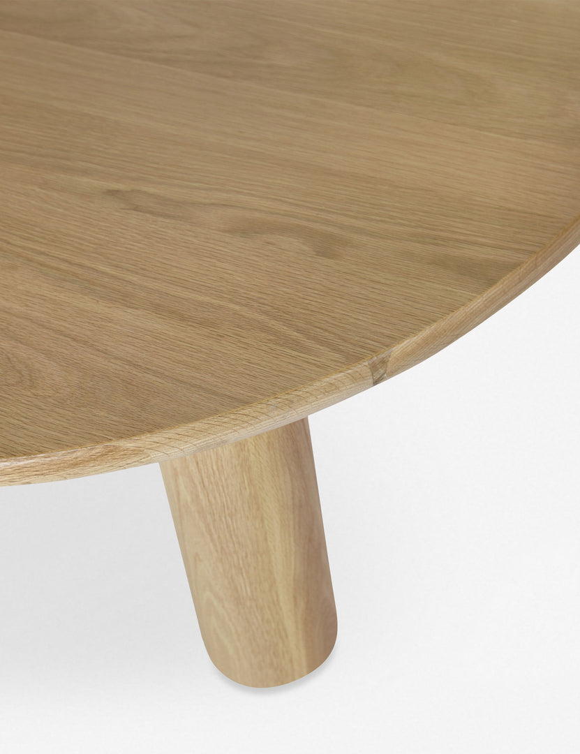 #color::natural | Close up of the Dever oak wood round dining table.