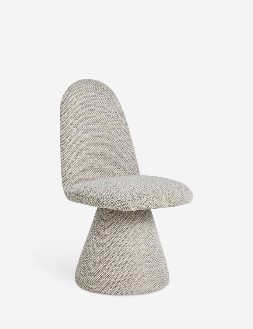 #color::natural-basketweave | Angled view of the Fenton textured sculptural upholstered minimalist dining chair.