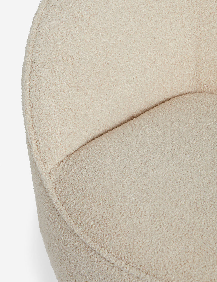 | Close up view of the Fern scalloped back boucle upholstered swivel chair
