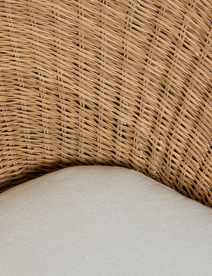 Close up of the Ferran sculptural wicker outdoor accent chair.