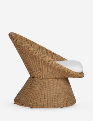 Side profile of the Ferran sculptural wicker outdoor accent chair.