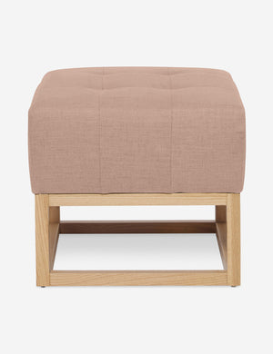 Apricot Linen Grasmere Ottoman with an upholstered cushion and airy wooden frame by Ginny Macdonald