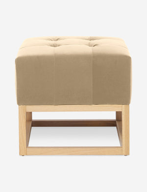 Brie Velvet Grasmere Ottoman with an upholstered cushion and airy wooden frame by Ginny Macdonald