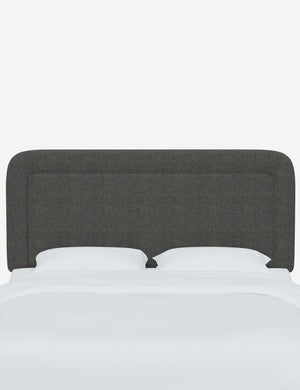 Gwendolyn Charcoal Gray Linen headboard with soft, arched corners and an interior welt border