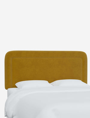 Angled view of the Gwendolyn Citronella Yellow Velvet headboard