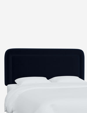 Angled view of the Gwendolyn Navy Velvet headboard