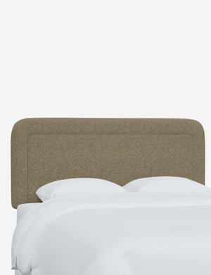 Angled view of the Gwendolyn Pebble Gray Linen headboard