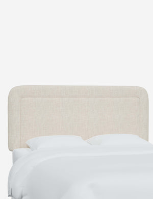 Angled view of the Gwendolyn Talc Linen headboard
