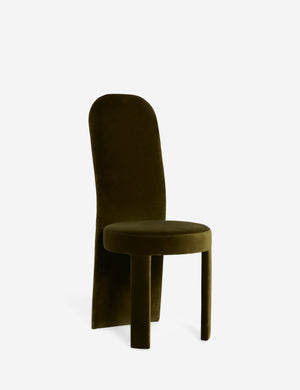 Angled view of the Halbrook upholstered tall back sculptural dining chair in green velvet