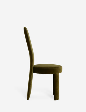 Side view of the Halbrook upholstered tall back sculptural dining chair in green velvet