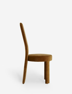Side view of the Halbrook upholstered tall back sculptural dining chair in sienna velvet
