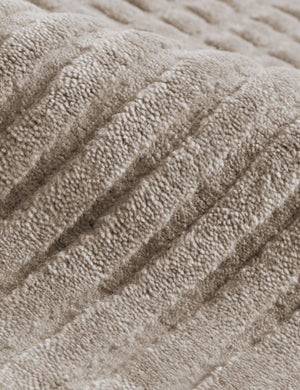 Close up of the Halden handwoven carved design rug.