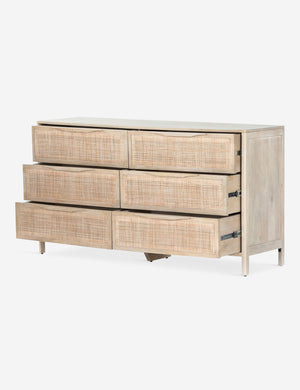 Angled view with opened drawers on the Hannah light wood 6-drawer dresser with cane-front drawers