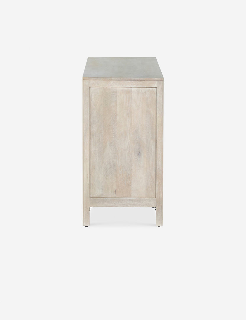 #color::natural | Side view of the Hannah light wood 6-drawer dresser with cane-front drawers