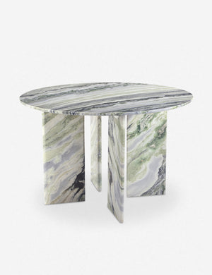 Angled view of the Celia sculptural round marble dining table.