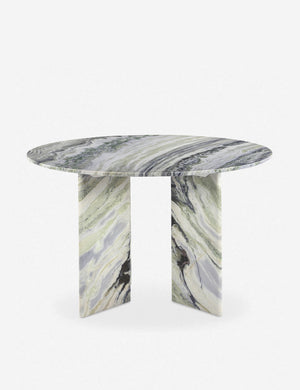 Celia sculptural round marble dining table.