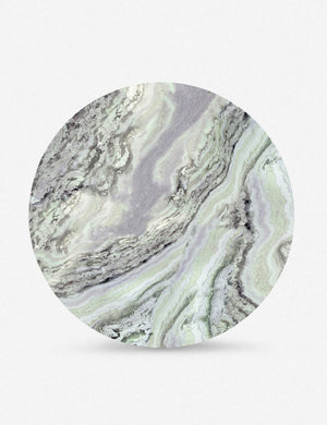 Top of the Celia sculptural round marble dining table.