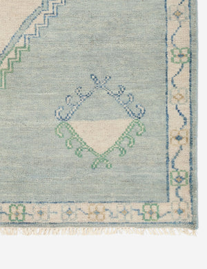 Corner details of the Berker turkish-inspired hand-knotted wool rug.