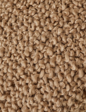 Close up of the Jaffe chunky knit fringed outdoor throw blanket in terracotta.