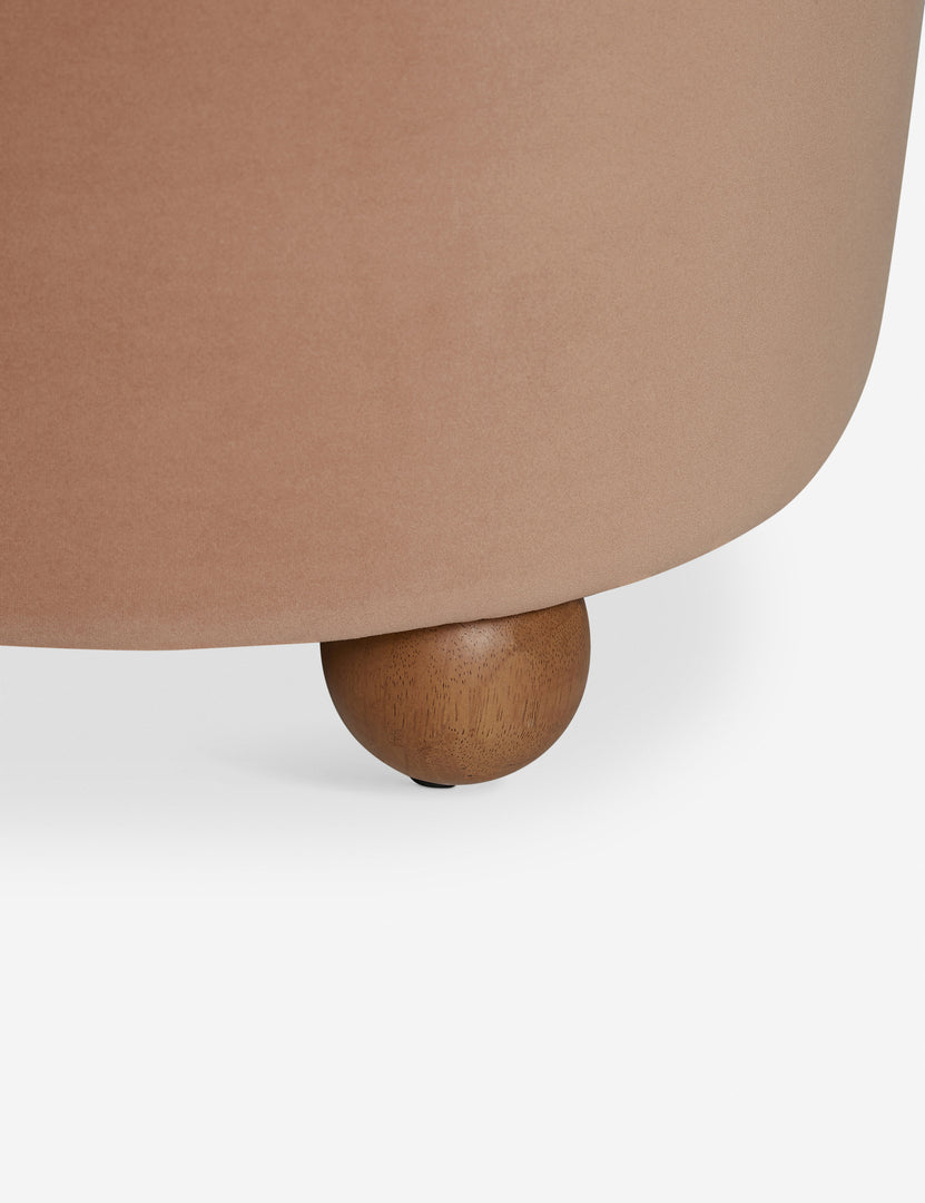 #color::blush-velvet | Wooden foot of the Judson modern round velvet dining chair.