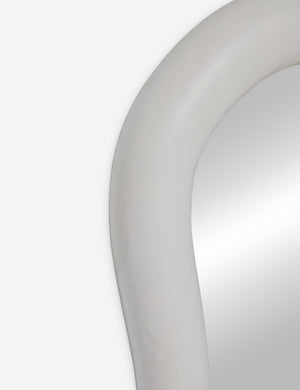 Close up of the Junah organic oval shaped wall mirror in white