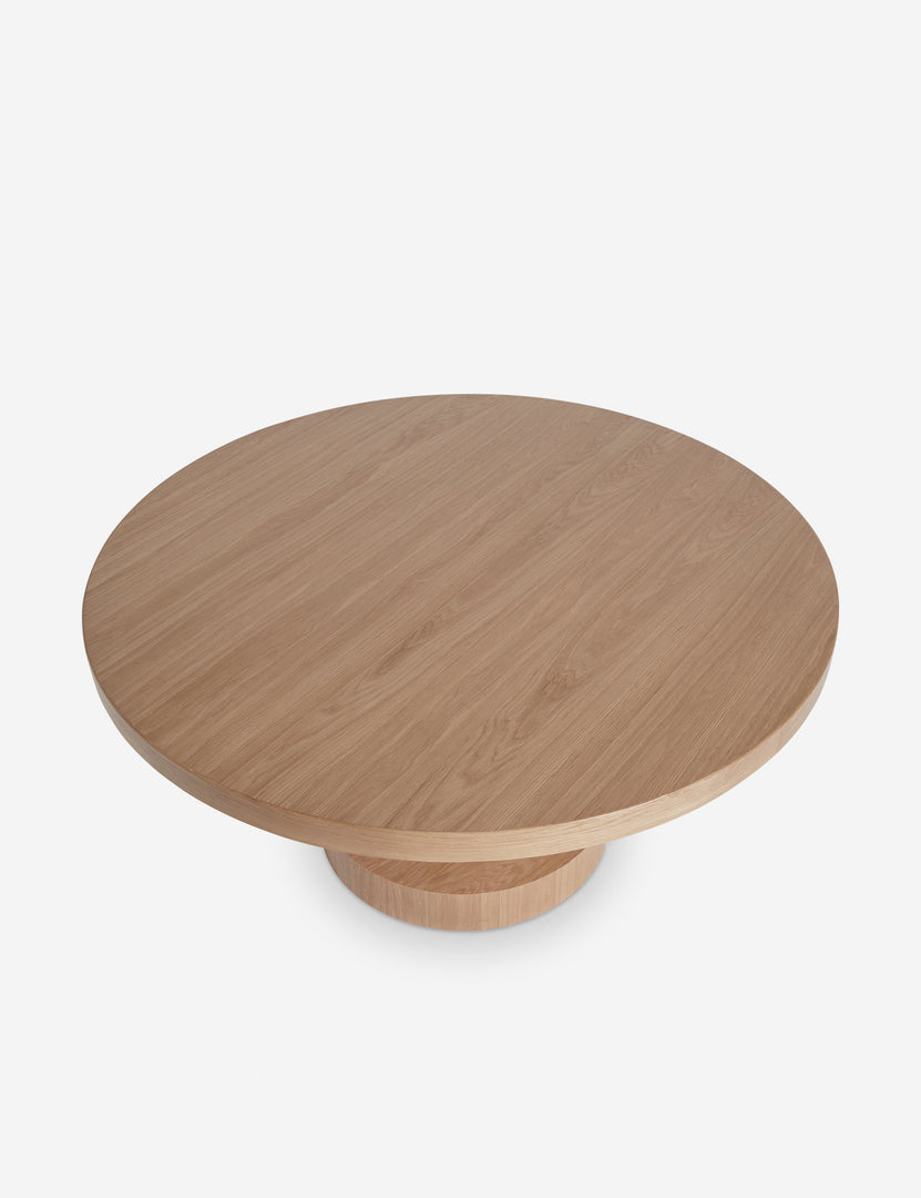 #color::natural | Overhead view of the Karine round natural wood pedestal dining table