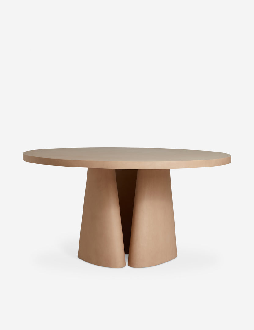 #color::terracotta | Keating sculptural round fiberstone outdoor dining table.