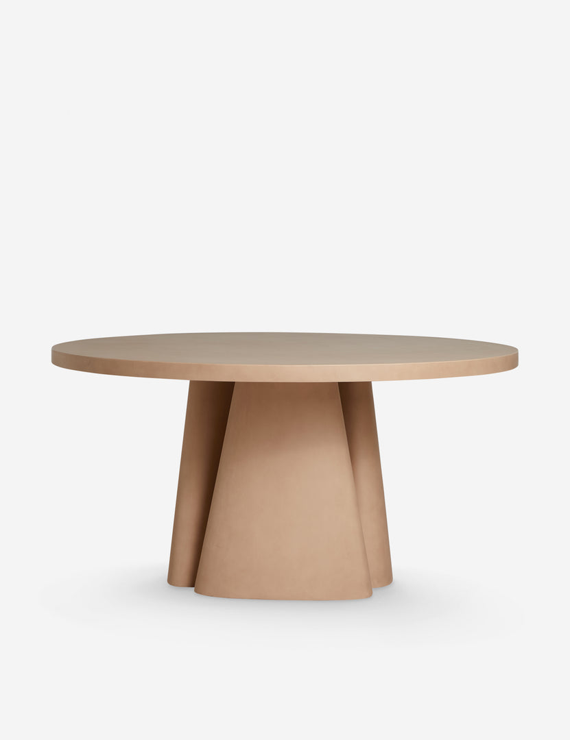 #color::terracotta | Side profile of the Keating sculptural round fiberstone outdoor dining table.