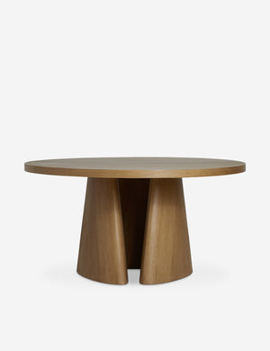 Keating round geometric wood pedestal dining table.
