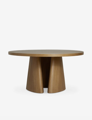 Keating round geometric wood pedestal dining table.