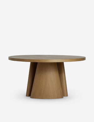 Keating round geometric wood pedestal dining table.
