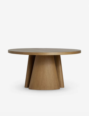 Keating round geometric wood pedestal dining table.