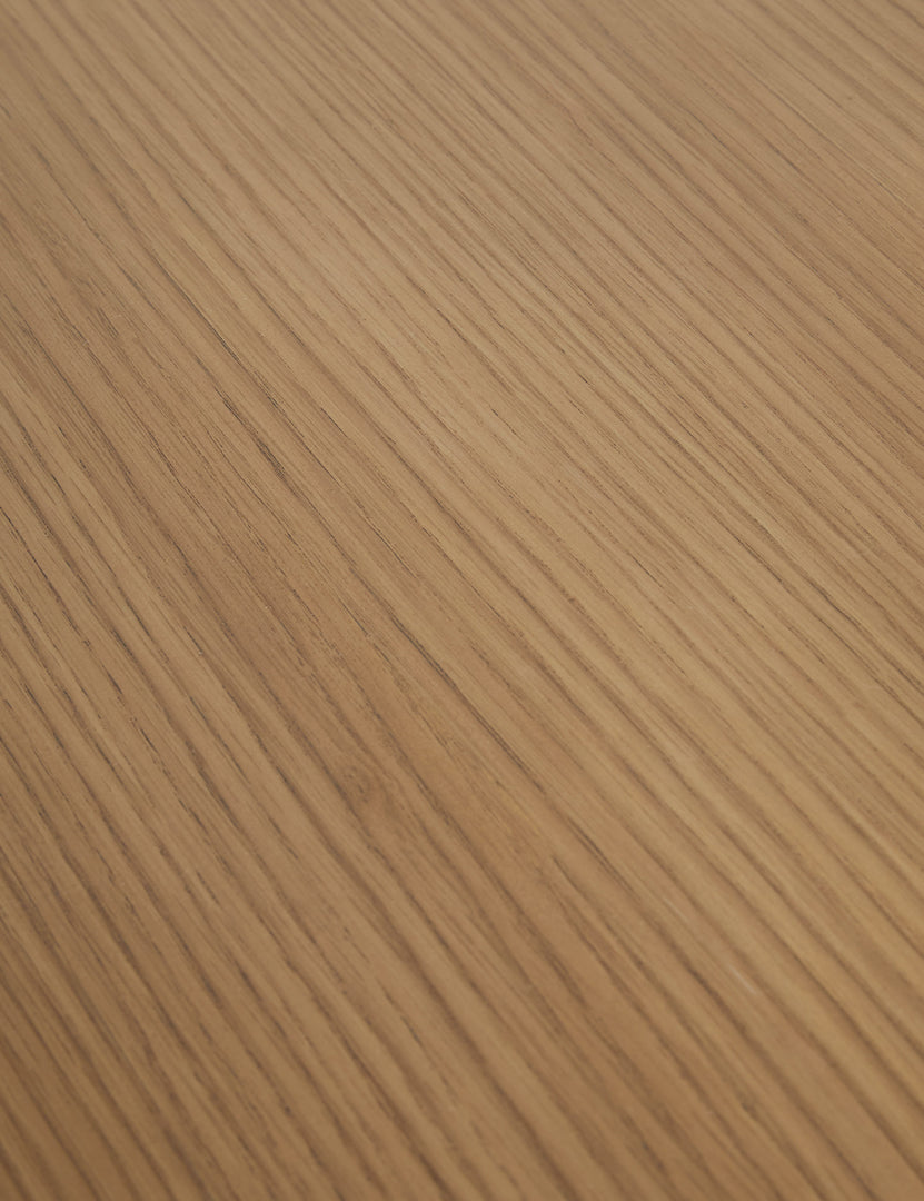 #color::russet | Close up of the Keating round geometric wood pedestal dining table.