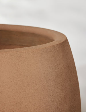 Close up of the Kenna rounded fiberstone planter.