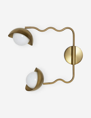 Side view of the Kukka modern wavy adjustable two arm wall sconce in brass