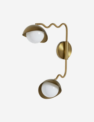 Side view of the Kukka modern wavy adjustable two arm wall sconce in brass