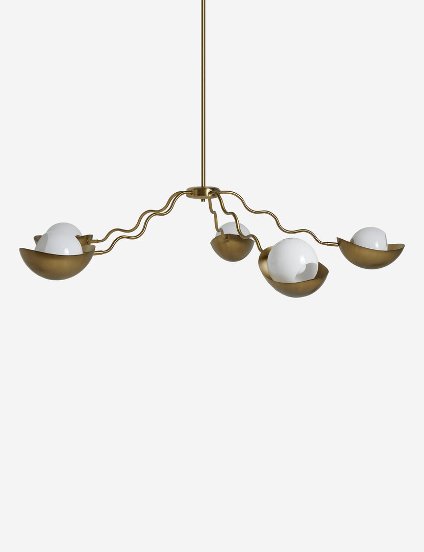 #color::brass #size::62-dia | Side view of the Kukka large modern wavy arm chandelier in brass