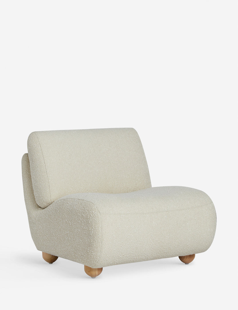 #color::ivory-basket-boucle | Angled view of the Kya textural boucle armless accent chair.