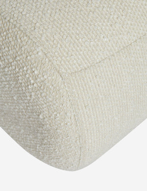 Close up of the Kya textural boucle armless accent chair.