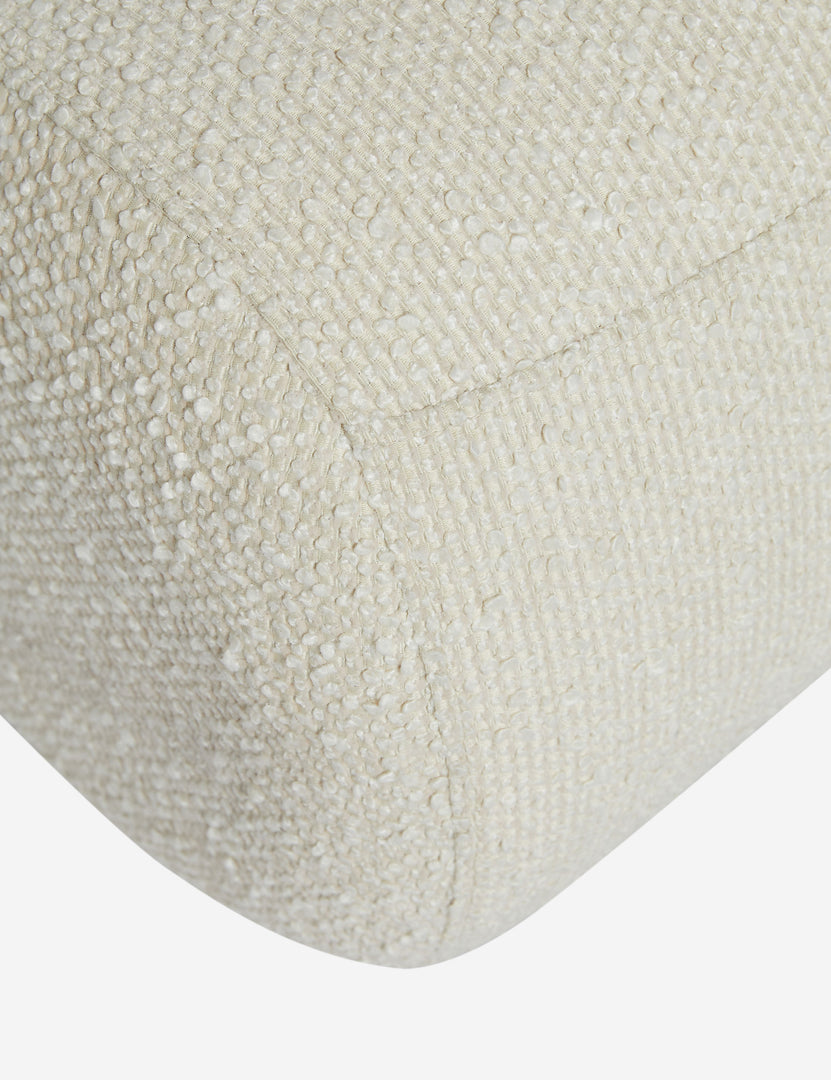 #color::ivory-basket-boucle | Close up of the Kya textural boucle armless accent chair.