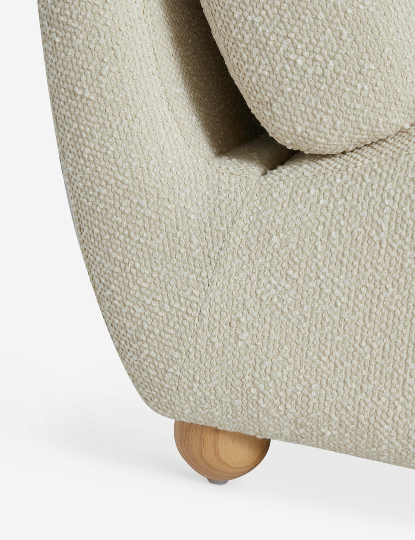 #color::ivory-basket-boucle | Close up of the Kya textural boucle armless accent chair.